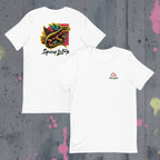 Front and back Neon gecko tropical pop-art streetwear  graphic on a white flat lay tee in front of a concrete wall with graffiti splashes in pink and yellow