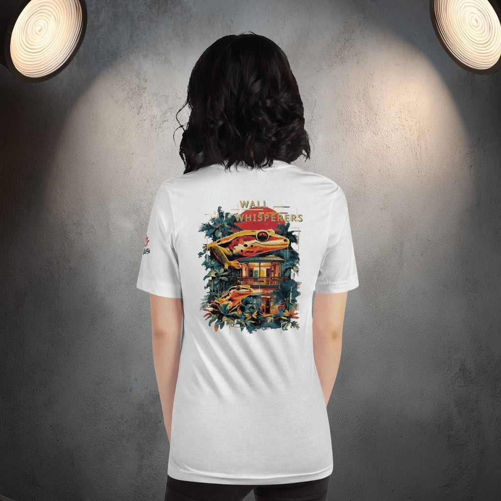 Wall Whisperers Saigon gecko back print t-shirt on a woman in a studio with grey wall
