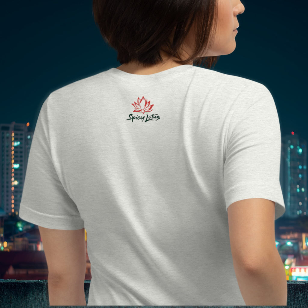 Person wearing a white t-shirt with a logo on the back against a cityscape background